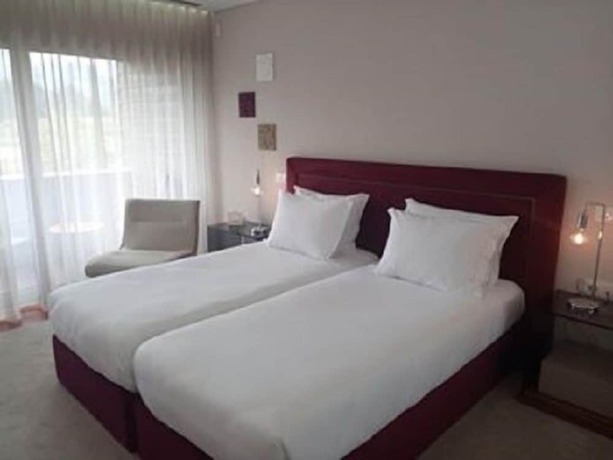 Imagen de la habitación del Hotel FH. Foto 12