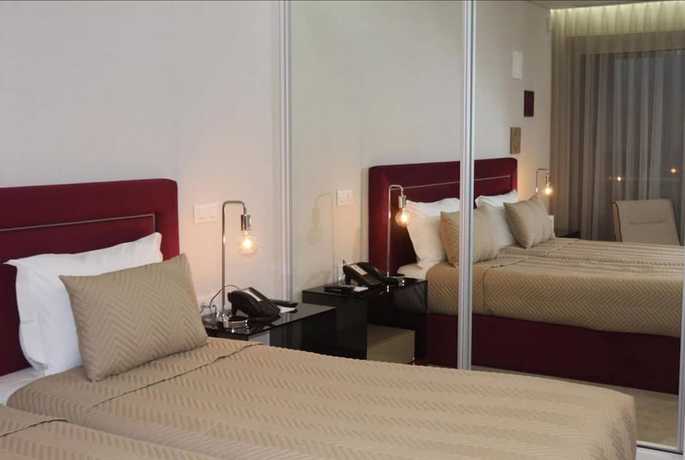 Imagen de la habitación del Hotel FH. Foto 14