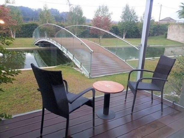 Imagen de la habitación del Hotel FH. Foto 19