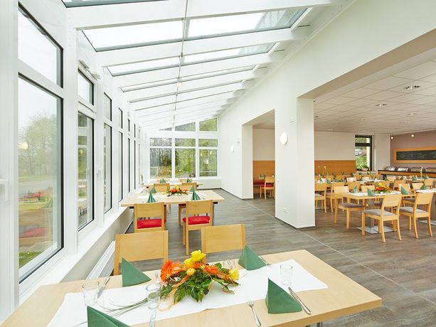 Imagen del bar/restaurante del Hotel FIT, Much. Foto 11