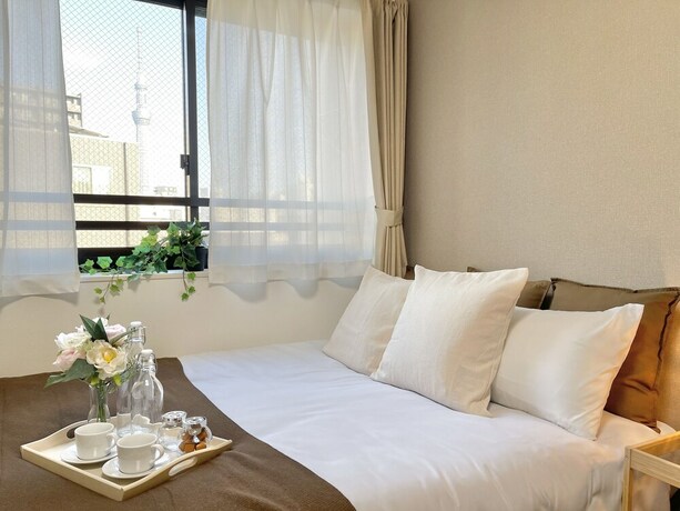 Imagen de la habitación del Hotel FL Residence Asakusa. Foto 16