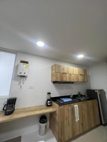 Imagen de la habitación del Hotel FLORA SUITES DELUXE. Foto 18