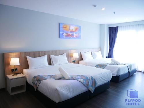 Imagen de la habitación del Hotel FLYPOD HOTEL. Foto 5