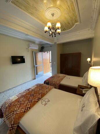 Imagen de la habitación del Hotel FONO H&Ocirc;TEL Sarl. Foto 17