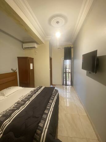 Imagen de la habitación del Hotel FONO H&Ocirc;TEL Sarl. Foto 18