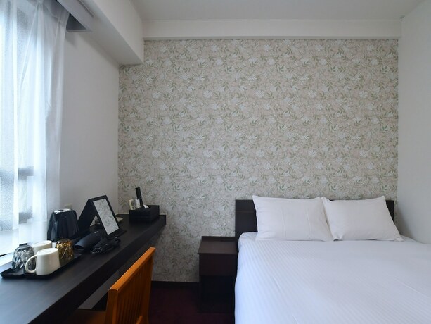 Imagen de la habitación del Hotel FORBELL STAY YURIGAOKA. Foto 17