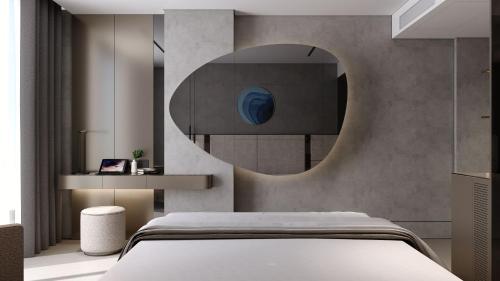 Imagen de la habitación del Hotel FOUR HILLS HOTEL. Foto 18