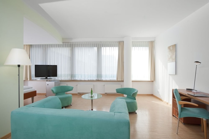 Imagen de la habitación del Hotel FOUR Munich Neue Messe. Foto 11