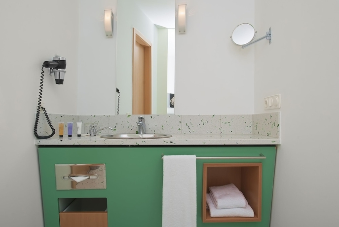 Imagen de la habitación del Hotel FOUR Munich Neue Messe. Foto 17