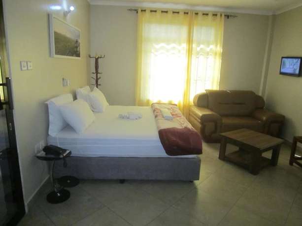 Imagen de la habitación del Hotel FQ. Foto 10