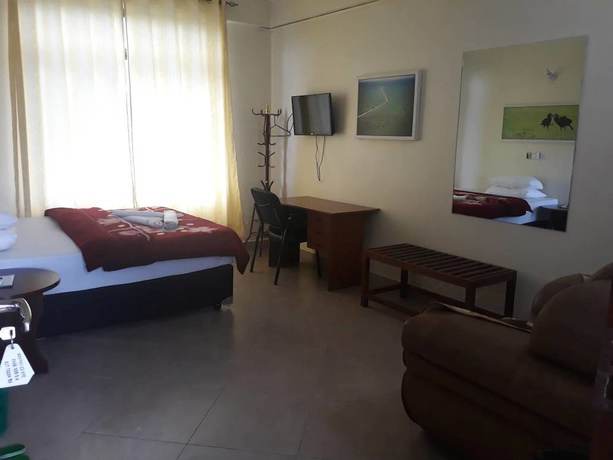 Imagen de la habitación del Hotel FQ. Foto 14