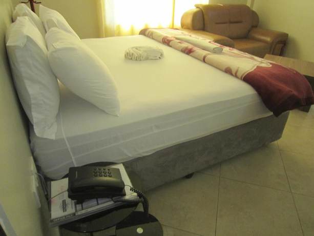 Imagen de la habitación del Hotel FQ. Foto 16