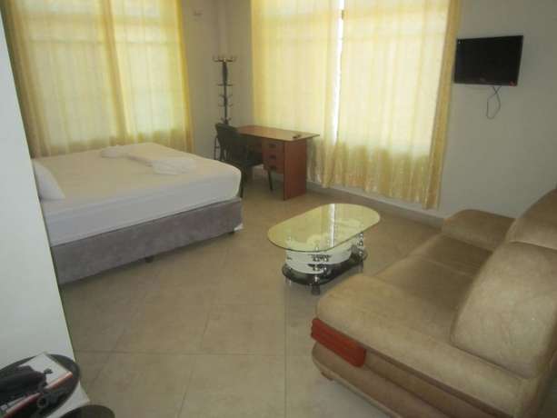 Imagen de la habitación del Hotel FQ. Foto 17