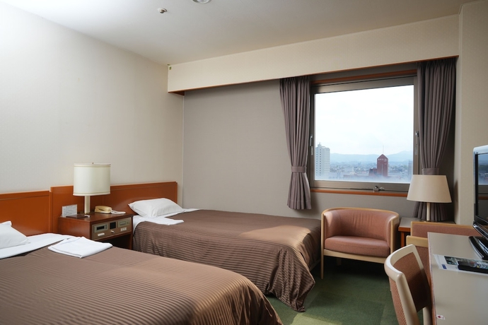 Imagen de la habitación del Hotel FREX HOTEL. Foto 8