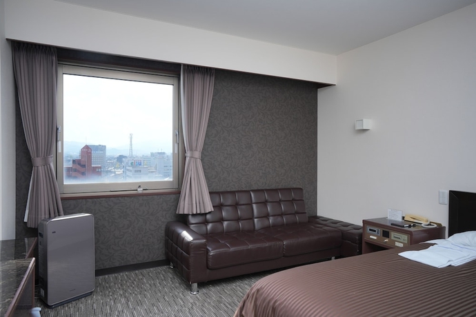Imagen de la habitación del Hotel FREX HOTEL. Foto 11