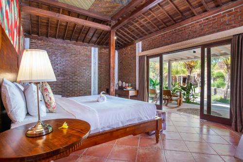 Imagen de la habitación del Hotel FRii Resort Gili Trawangan. Foto 17