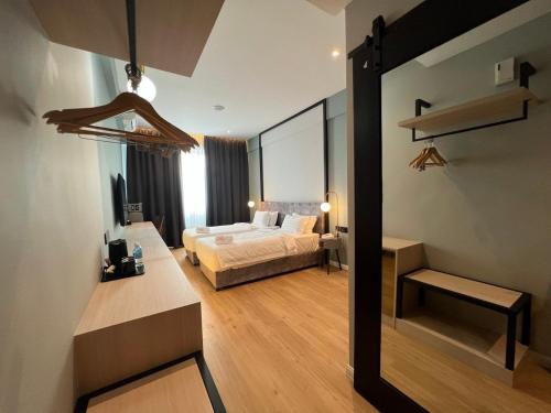 Imagen de la habitación del Hotel FUHOTEL. Foto 18