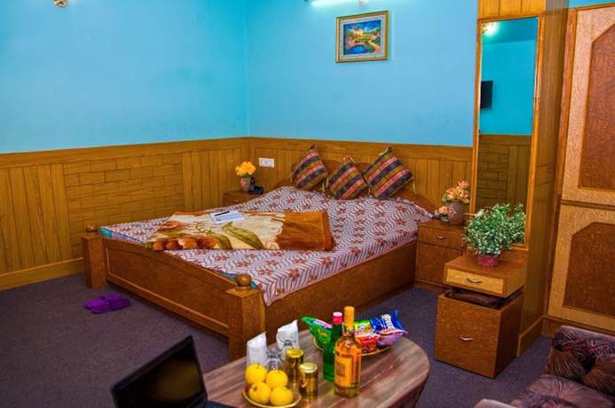 Imagen de la habitación del Hotel FabAditya Home Stay. Foto 4