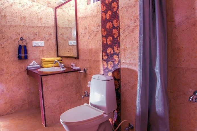 Imagen de la habitación del Hotel FabAditya Home Stay. Foto 5