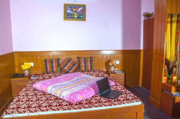 Imagen de la habitación del Hotel FabAditya Home Stay. Foto 6