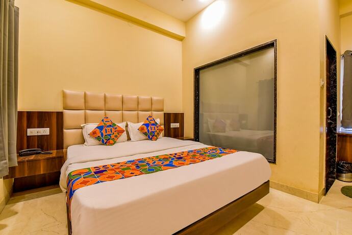 Imagen de la habitación del Hotel FabDosa Plaza. Foto 18