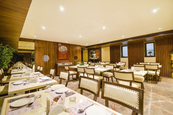 Imagen del bar/restaurante del Hotel FabEco Stay. Foto 5