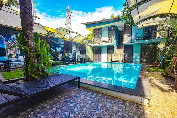 Imagen general del Hotel FabEscape Sion Resort With Pool, Candolim. Foto 14