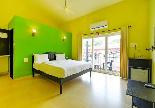 Imagen de la habitación del Hotel FabEscape Vagator Retreat Resort With Swimming Pool. Foto 18