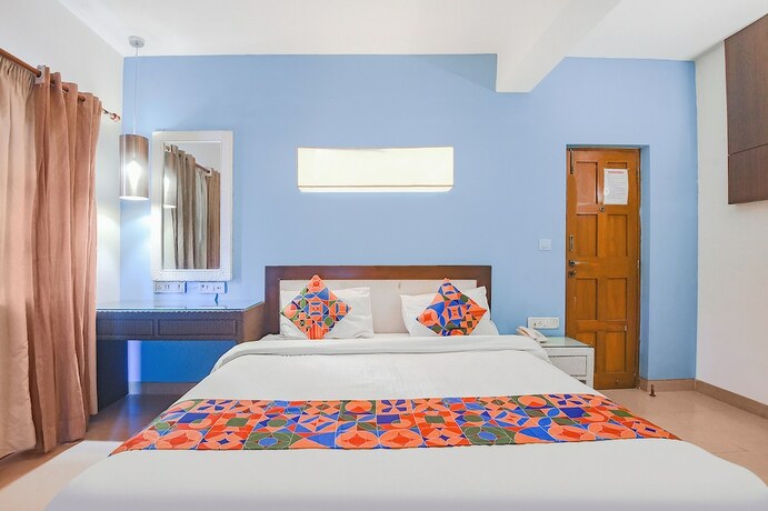 Imagen de la habitación del Hotel FabExpress Coco Goa Resort With Pool, Arpora. Foto 16