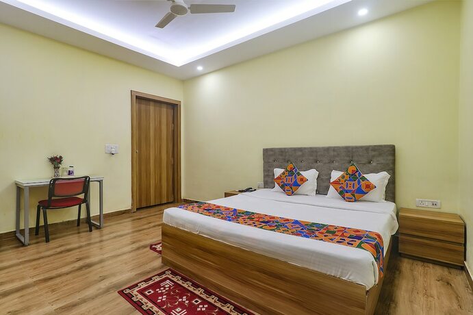 Imagen de la habitación del Hotel FabExpress Le Gardenia. Foto 19