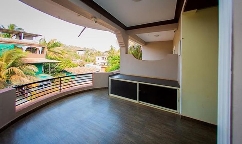 Imagen general del Hotel FabExpress Morjim Highland With Swimming Pool. Foto 2