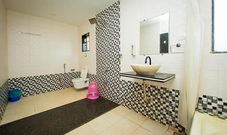 Imagen general del Hotel FabExpress Morjim Highland With Swimming Pool. Foto 7