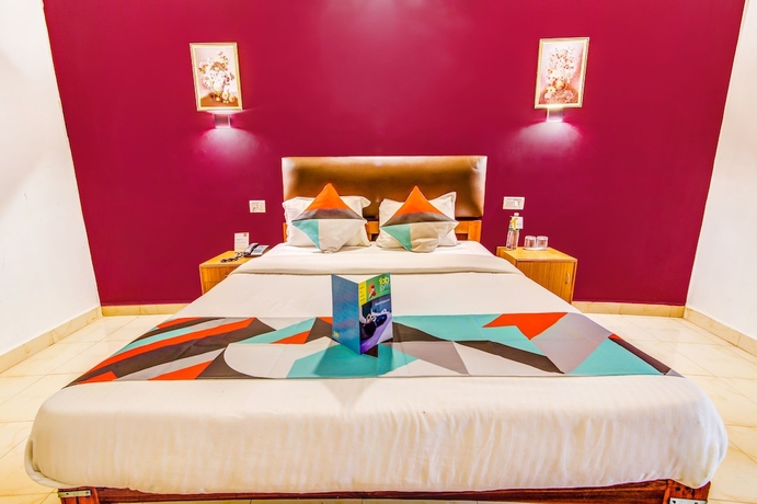 Imagen de la habitación del Hotel FabExpress Seafinity Resort. Foto 3
