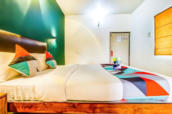 Imagen de la habitación del Hotel FabExpress Seafinity Resort. Foto 15
