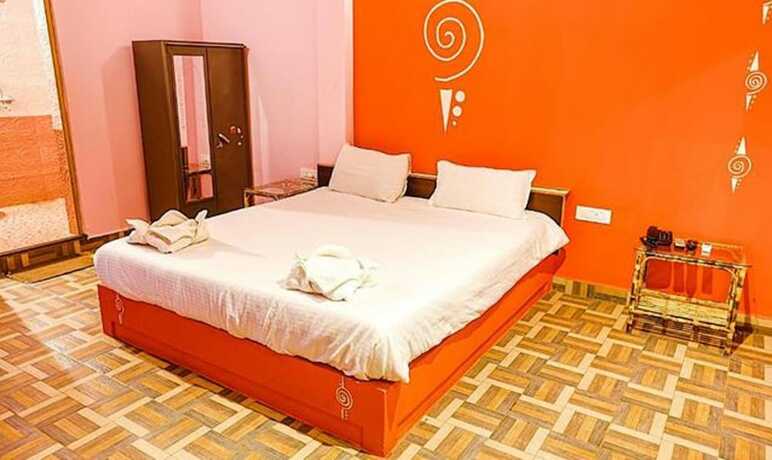 Imagen de la habitación del Hotel FabExpress The Voyage, Morjim. Foto 19