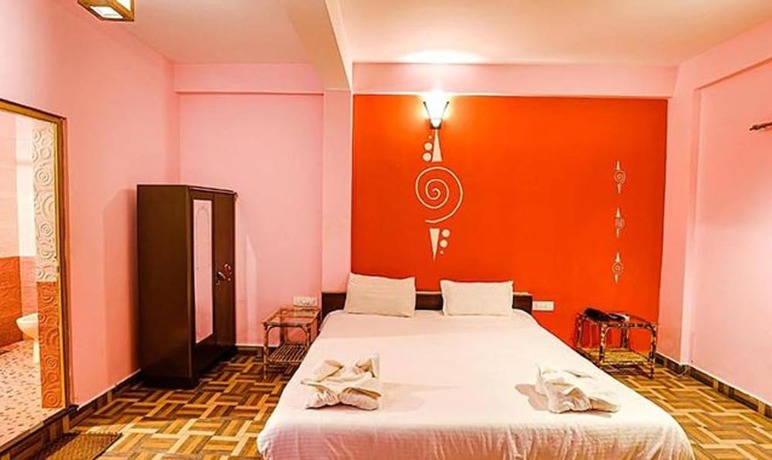 Imagen de la habitación del Hotel FabExpress The Voyage, Morjim. Foto 20