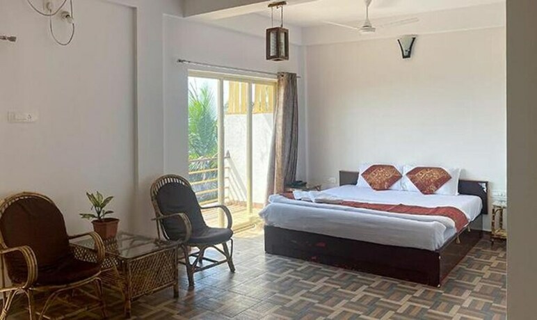 Imagen general del Hotel FabExpress The Voyage, Morjim. Foto 17