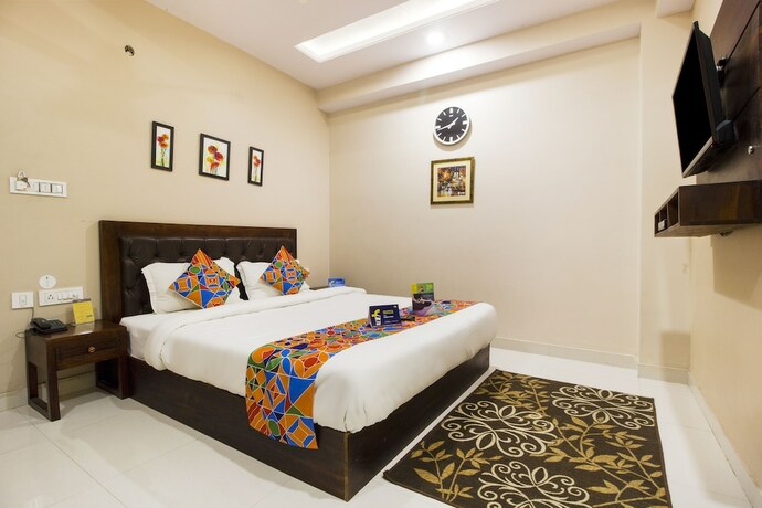Imagen de la habitación del Hotel FabExpress Travelers Lodge. Foto 19