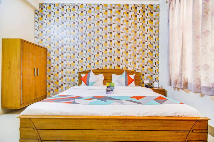 Imagen de la habitación del Hotel FabGomti. Foto 10