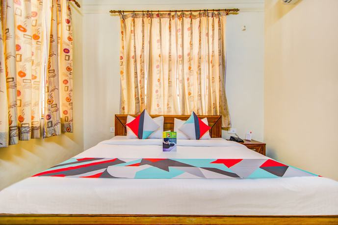 Imagen de la habitación del Hotel FabGomti. Foto 15