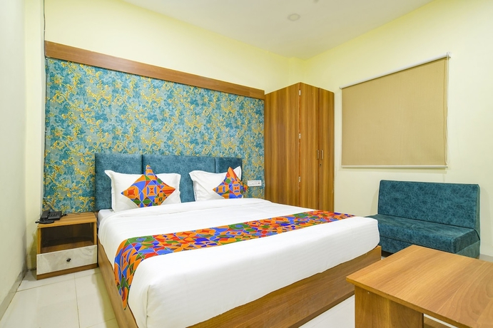 Imagen de la habitación del Hotel FabGrand Giriraj. Foto 2