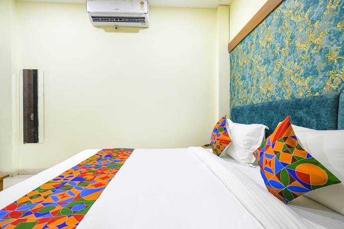 Imagen de la habitación del Hotel FabGrand Giriraj. Foto 7
