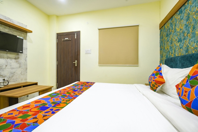 Imagen de la habitación del Hotel FabGrand Giriraj. Foto 8