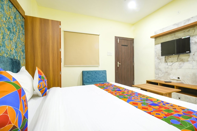 Imagen de la habitación del Hotel FabGrand Giriraj. Foto 10