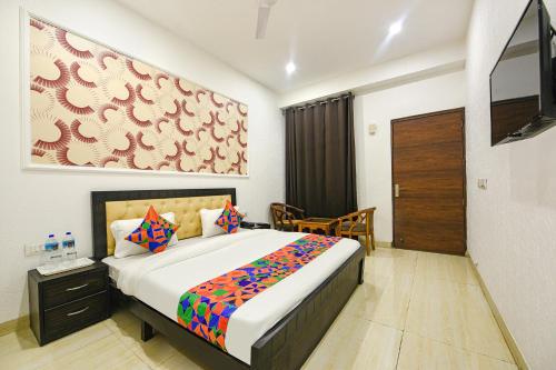 Imagen de la habitación del Hotel FabHC Mount View. Foto 18