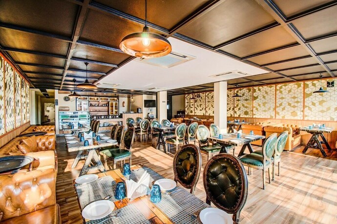 Imagen del bar/restaurante del Hotel FabHotel Prime V Hazratganj. Foto 1