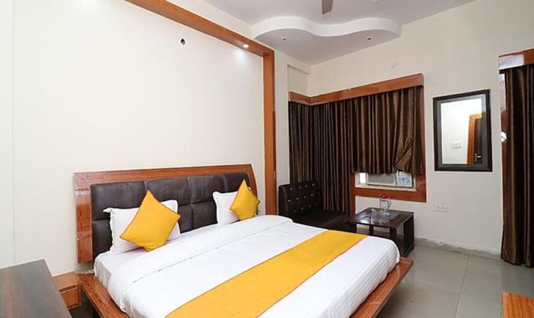 Imagen de la habitación del Hotel FabNeena Palace. Foto 8