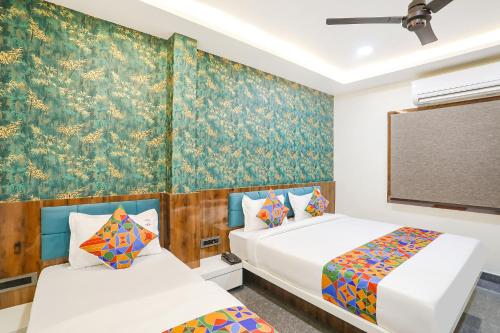 Imagen de la habitación del Hotel FabPrime Diamond Palace. Foto 20