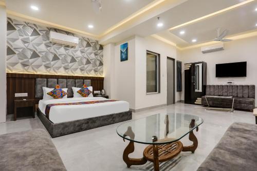 Imagen de la habitación del Hotel FabPrime Panchwati Regency. Foto 19