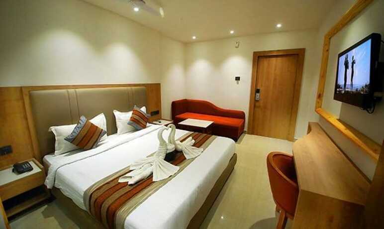 Imagen de la habitación del Hotel FabPrime Surya. Foto 12